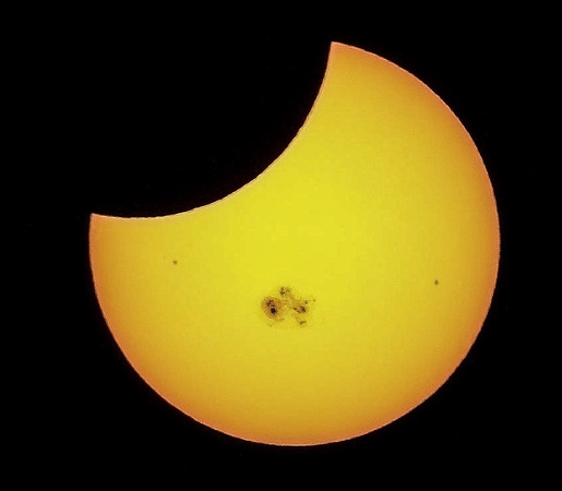 Partial Solar Eclipse With Huge Sunspots