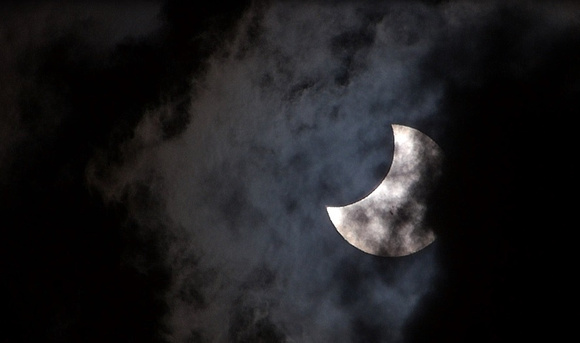 Cloud Helps Moon Obscure Sun
